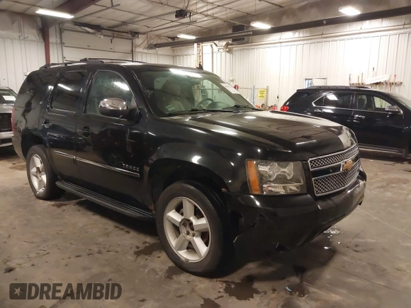 2012 Chevrolet Tahoe LTZ with VIN 1GNSKCE02CR297261, listed as a IAAI auction lot 40255137 with 283,110 mi miles and . Bid and sale history available at DreamBid. Image 1.