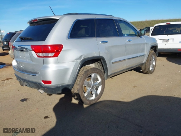 2012 Jeep Grand Cherokee Overland with VIN 1C4RJFCTXCC201422, listed as a IAAI auction lot 41283376 with 93,736 mi miles. Bid and sale history available at carsss.com. Image 4.
