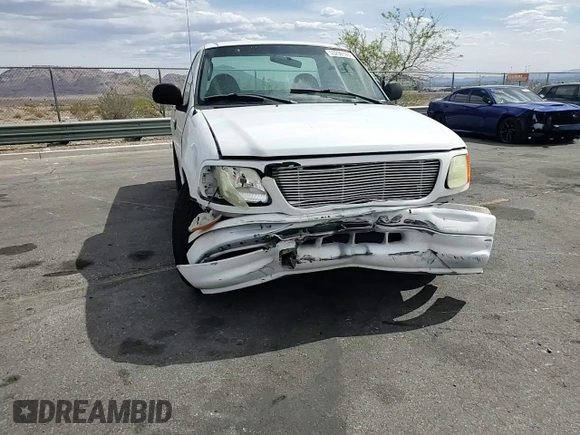 2004 Ford F-150 XL with VIN 2FTRF17294CA59985, listed as a Copart auction lot 55296195 with 220,933 mi miles and Salvage title. Bid and sale history available at DreamBid. Image 13.
