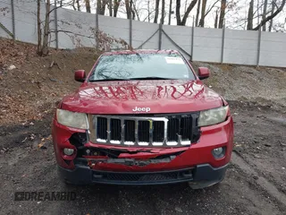 2012 Jeep Grand Cherokee Laredo with VIN 1C4RJFAG7CC123669, listed as a IAAI auction lot 42001472 with 164,806 mi miles. Bid and sale history available at carsss.com. Image 13.