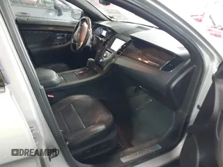 2014 Ford Taurus Limited with VIN 1FAHP2F81EG101351, listed as a IAAI auction lot 41662308 with 139,542 mi miles. Bid and sale history available at carsss.com. Image 5.