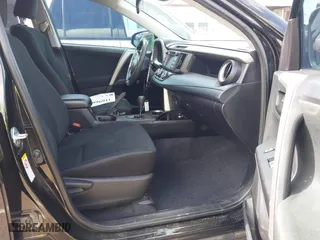 2018 Toyota RAV4 LE with VIN 2T3ZFREV9JW457062, listed as a IAAI auction lot 41696609 with 96,716 mi miles. Bid and sale history available at carsss.com. Image 5.