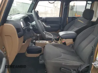 2015 Jeep Wrangler Unlimited Sahara z VIN 1C4BJWEG5FL645846, wystawiony jako Copart lot #53326855 z przebiegiem 122 510 mil mil oraz Szkoda całkowita • Salvage title. Historia ofert i sprzedaży dostępna na DreamBid. Obrazek 7.