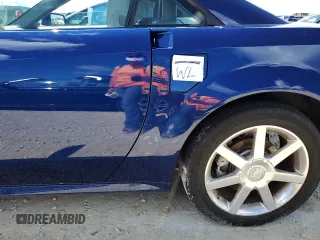 2004 Cadillac XLR z VIN 1G6YV34A045601459, wystawiony jako Copart lot #74522994 z przebiegiem Nie podano mil oraz Szkody całkowita. Historia ofert i sprzedaży dostępna na DreamBid. Obrazek 12.