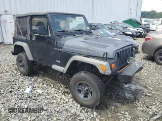 1999 Jeep Wrangler SE z VIN 1J4FY29P0XP479580, wystawiony jako Copart lot #63075455 z przebiegiem 160 986 mil mil oraz Szkoda całkowita • Salvage title. Historia ofert i sprzedaży dostępna na DreamBid. Obrazek 4.