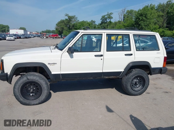 1996 Jeep Cherokee Sport z VIN 1J4FJ68S3TL226188, wystawiony jako IAAI lot #42460538 z przebiegiem 217 118 mil mil oraz . Historia ofert i sprzedaży dostępna na DreamBid. Obrazek 14.
