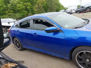 2017 Honda Civic LX with VIN 19XFC2F53HE217867, listed as a IAAI auction lot 42296194 with 104,670 mi miles and . Bid and sale history available at DreamBid. Image 13.