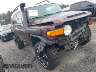 2007 Toyota FJ Cruiser with VIN JTEBU11F970030450, listed as a IAAI auction lot 41613421 with 214,384 mi miles. Bid and sale history available at carsss.com. Image 1.