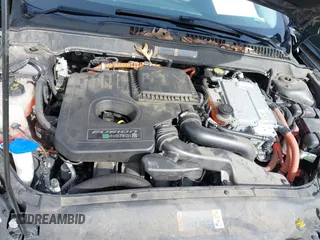 2015 Ford Fusion Energi Titanium with VIN 3FA6P0SU0FR200963, listed as a IAAI auction lot 41897182 with 104,100 mi miles. Bid and sale history available at carsss.com. Image 10.
