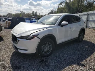 2021 Mazda CX-5 Touring with VIN JM3KFBCM3M1494718, listed as a Copart auction lot 45726485 with 51,792 mi miles and Salvage Title. Bid and sale history available at carsss.com. Image 1.
