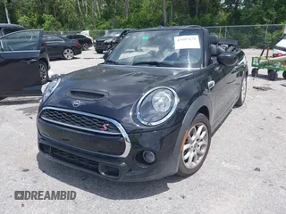 2021 MINI Convertible Cooper S z VIN WMWWJ5C0XM3M08622, wystawiony jako IAAI lot #42507679 z przebiegiem 36 932 mil mil oraz . Historia ofert i sprzedaży dostępna na DreamBid. Obrazek 2.