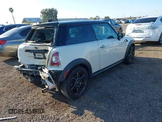 2011 MINI Hardtop with VIN WMWSU3C54BT252130, listed as a IAAI auction lot 41854369 with 145,528 mi miles and . Bid and sale history available at DreamBid. Image 4.