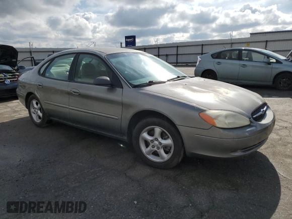 2001 Ford Taurus LX with VIN 1FAFP52U01A131563, listed as a Copart auction lot 89201965 with 79,048 mi miles and Salvage title. Bid and sale history available at DreamBid. Image 4.