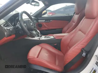 2012 BMW Z4 sDrive35i with VIN WBALM7C55CE385061, listed as a Copart auction lot 48051044 with 87,369 mi miles and Salvage Title. Bid and sale history available at carsss.com. Image 7.