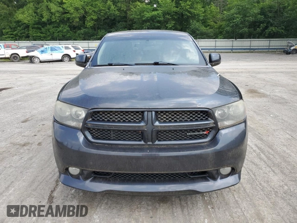 2013 Dodge Durango SXT with VIN 1C4RDJAG2DC679979, listed as a Copart auction lot 64377695 with 209,671 mi miles and Clean title. Bid and sale history available at DreamBid. Image 5.