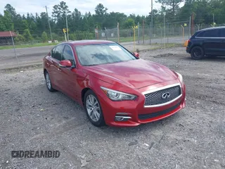 2015 Infiniti Q50 z VIN JN1BV7AP3FM341590, wystawiony jako IAAI lot #42470009 z przebiegiem 243 571 mil mil oraz . Historia ofert i sprzedaży dostępna na DreamBid. Obrazek 1.