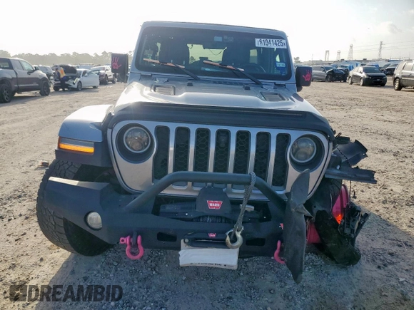 2021 Jeep Wrangler Unlimited Rubicon with VIN 1C4HJXFG0MW616829, listed as a Copart auction lot 61041425 with 128,724 mi miles and Salvage title. Bid and sale history available at DreamBid. Image 5.