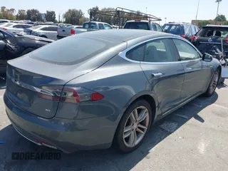 2014 Tesla Model S 60 z VIN 5YJSA1S16EFP40968, wystawiony jako IAAI lot #42331754 z przebiegiem 159 717 mil mil oraz . Historia ofert i sprzedaży dostępna na DreamBid. Obrazek 4.
