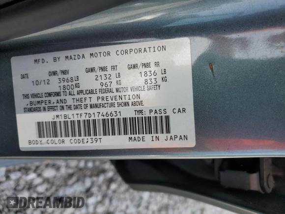 2013 Mazda 3 i SV with VIN JM1BL1TF7D1746631, listed as a Copart auction lot 57361665 with 149,891 mi miles and Salvage title. Bid and sale history available at DreamBid. Image 12.