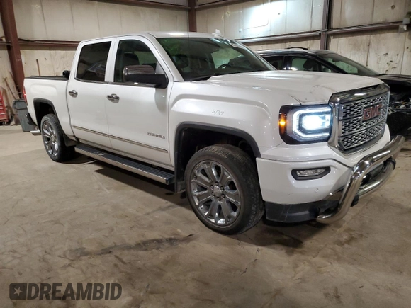 2017 GMC Sierra 1500 Denali with VIN 3GTU2PEJ2HG331787, listed as a Copart auction lot 82601664 with 112,008 mi miles and Salvage Title. Bid and sale history available at DreamBid. Image 4.