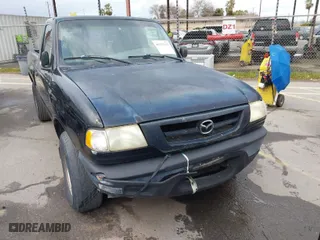 2003 Mazda B-Series 2WD Truck SX with VIN 4F4YR12D23TM09609, listed as a IAAI auction lot 41571323 with 194,860 mi miles. Bid and sale history available at carsss.com. Image 6.