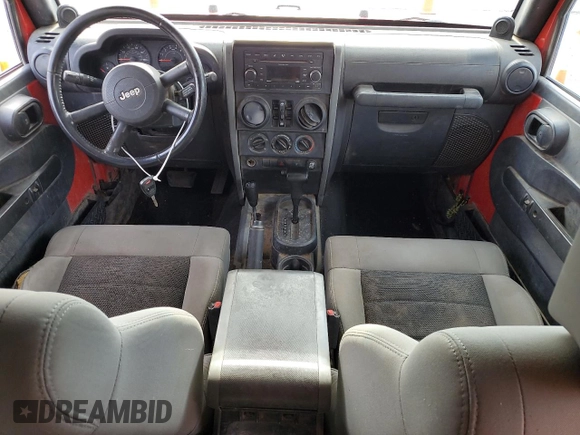 2008 Jeep Wrangler Unlimited X с VIN 1J4GA39188L594432, выставлен на аукционе Copart как лот 62854645 с пробегом 139 304 миль миль и Списание • Salvage title. История ставок и продаж доступна на DreamBid. Изображение 8.