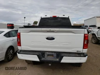 2021 Ford F-150 XL with VIN 1FTFW1E51MFB62435, listed as a Copart auction lot 54403394 with 0 mi miles and Salvage Title. Bid and sale history available at carsss.com. Image 6.