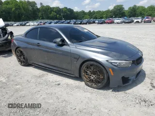 2018 BMW M4 with VIN WBS4Z9C50JED22222, listed as a Copart auction lot 57043595 with 71,899 mi miles and Salvage title. Bid and sale history available at DreamBid. Image 4.