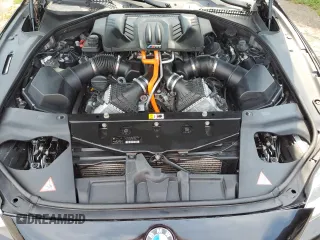 2014 BMW M6 z VIN WBSLX9C54ED160430, wystawiony jako Copart lot #66270794 z przebiegiem 92 025 mil mil oraz Szkoda całkowita • Salvage title. Historia ofert i sprzedaży dostępna na DreamBid. Obrazek 11.