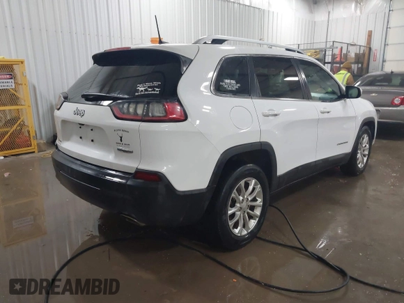 2019 Jeep Cherokee Latitude with VIN 1C4PJLCX2KD205286, listed as a IAAI auction lot 41276437 with 112,333 mi miles. Bid and sale history available at carsss.com. Image 4.