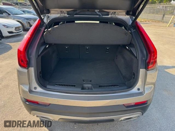 2023 Cadillac XT4 AWD Premium Luxury with VIN 1GYFZDR40PF108407, listed as a Copart auction lot 54799365 with 8,724 mi miles and Non Repairable. Bid and sale history available at carsss.com. Image 6.