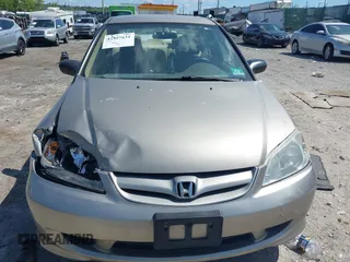 2004 Honda Civic LX z VIN 2HGES16524H640304, wystawiony jako IAAI lot #42307631 z przebiegiem 147 445 mil mil oraz . Historia ofert i sprzedaży dostępna na DreamBid. Obrazek 12.
