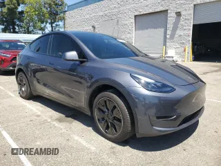 2024 Tesla Model Y Long Range with VIN 7SAYGDEEXRA215975, listed as a Copart auction lot 56705585 with 20,554 mi miles and Salvage Title. Bid and sale history available at DreamBid. Image 4.