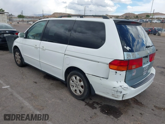 2001 Honda Odyssey EX z VIN 2HKRL18661H566973, wystawiony jako IAAI lot #42117015 z przebiegiem 206 999 mil mil oraz . Historia ofert i sprzedaży dostępna na DreamBid. Obrazek 3.