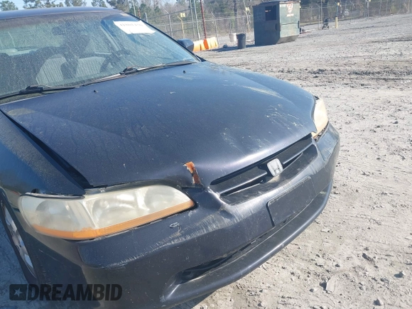 1998 Honda Accord LX z VIN 1HGCG5641WA215469, wystawiony jako IAAI lot #41801430 z przebiegiem 228 903 mil mil oraz . Historia ofert i sprzedaży dostępna na DreamBid. Obrazek 6.