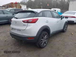 2017 Mazda CX-3 Touring with VIN JM1DKFC77H0155101, listed as a IAAI auction lot 41722040 with 92,653 mi miles. Bid and sale history available at carsss.com. Image 4.