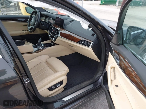 2019 BMW 5 Series 530i xDrive with VIN WBAJA7C5XKWW31983, listed as a IAAI auction lot 41893477 with 127,535 mi miles and . Bid and sale history available at DreamBid. Image 5.