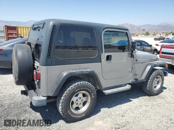 2000 Jeep Wrangler SE with VIN 1J4FA29P7YP737289, listed as a Copart auction lot 61869865 with 91,097 mi miles and Salvage title. Bid and sale history available at DreamBid. Image 3.
