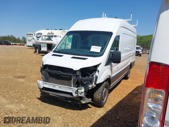 2021 Ford Transit Cargo z VIN 1FTBW3X88MKA42155, wystawiony jako IAAI lot #41988889 z przebiegiem 74 643 mil mil oraz . Historia ofert i sprzedaży dostępna na DreamBid. Obrazek 18.