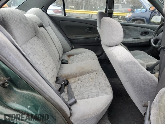 1998 Mitsubishi Mirage DE z VIN JA3AY26A2WU042095, wystawiony jako Copart lot #84700394 z przebiegiem 124 362 mil mil oraz Czysty tytuł • Clean title. Historia ofert i sprzedaży dostępna na DreamBid. Obrazek 10.