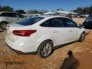 2018 Ford Focus SE with VIN 1FADP3F23JL220312, listed as a Copart auction lot 46903995 with 128,549 mi miles and Salvage Title. Bid and sale history available at carsss.com. Image 3.