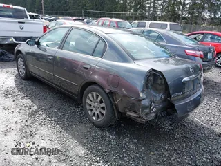 2006 Nissan Altima 2.5 with VIN 1N4AL11D06N304367, listed as a IAAI auction lot 41808294 with 198,815 mi miles. Bid and sale history available at carsss.com. Image 3.