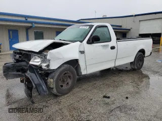 2002 Ford F-150 XL with VIN 1FTRF17W32NB86385, listed as a Copart auction lot 73276754 with 100,817 mi miles and Salvage Title. Bid and sale history available at carsss.com. Image 1.