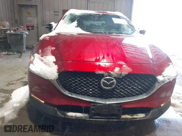 2022 Mazda CX-30 2.5 Turbo with VIN 3MVDMBAY5NM427943, listed as a IAAI auction lot 41585519 with 32,807 mi miles and . Bid and sale history available at DreamBid. Image 12.