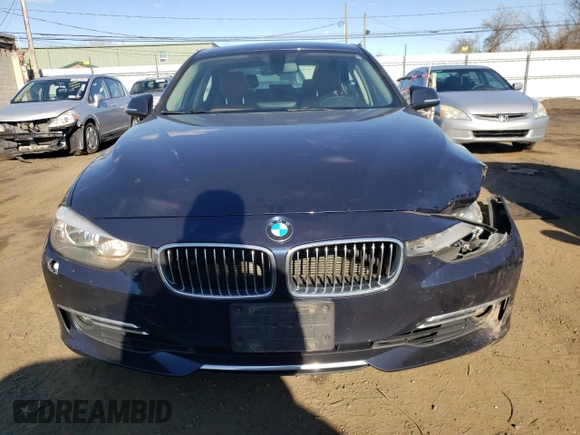 2015 BMW 3 Series 328i xDrive z VIN WBA3B5C55FF962857, wystawiony jako Copart lot #52691015 z przebiegiem 129 523 mil mil oraz Nie do naprawy • Non repairable. Historia ofert i sprzedaży dostępna na DreamBid. Obrazek 5.