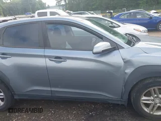 2019 Hyundai Kona SE with VIN KM8K12AAXKU298329, listed as a IAAI auction lot 42297990 with 57,176 mi miles and . Bid and sale history available at DreamBid. Image 13.