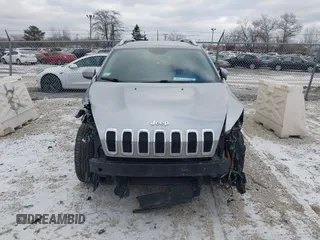 2016 Jeep Cherokee 75th Anniversary with VIN 1C4PJLCB1GW297555, listed as a IAAI auction lot 41232269 with 257,033 mi miles. Bid and sale history available at carsss.com. Image 12.