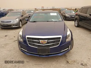 2015 Cadillac ATS Luxury AWD z VIN 1G6AH1RX6F0120173, wystawiony jako IAAI lot #41701867 z przebiegiem 70 142 mil mil oraz . Historia ofert i sprzedaży dostępna na DreamBid. Obrazek 12.