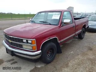 1989 Chevrolet C/K 1500 with VIN 1GCDC14K0KE190768, listed as a IAAI auction lot 42040702 with 165,890 mi miles. Bid and sale history available at carsss.com. Image 2.
