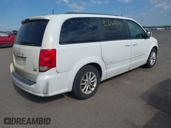 2016 Dodge Grand Caravan SXT with VIN 2C4RDGCG9GR380632, listed as a IAAI auction lot 42239479 with 197,316 mi miles and . Bid and sale history available at DreamBid. Image 4.